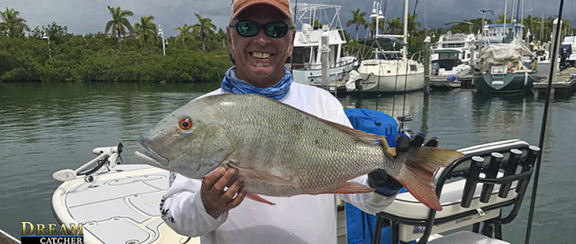 large mutton snapper held up in Key West